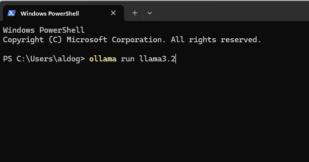 Finestra nera di Windows PowerShell con comando bianco: PS C:\Users\aldog> ollama run llama3.2 e titolo scheda in alto